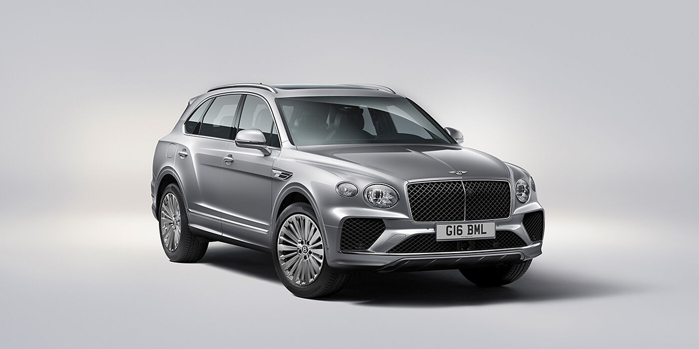 Bentley Hannover Bentley Bentayga luxury SUV front three quarter view in Moonbeam paint with matrix grille and 21″ 5 spoke painted wheels