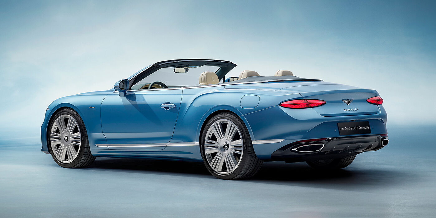 Bentley Hannover New Bentley Continental GTC Azure convertible rear view in Light Windsor blue paint with 22 inch ten spoke wheels and chrome exterior details