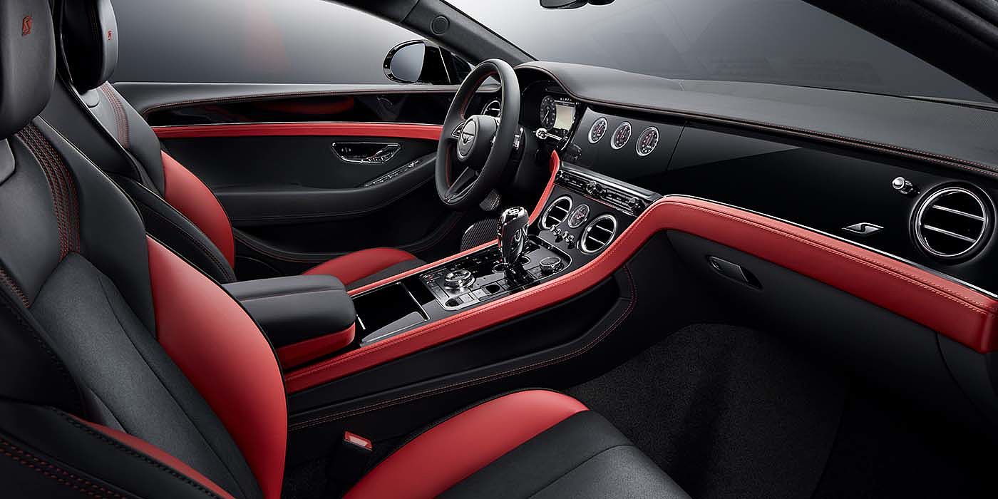 Bentley Hannover Bentley Continental GT S coupe front interior in Beluga black and Hotspur red hide with high gloss Carbon Fibre veneer