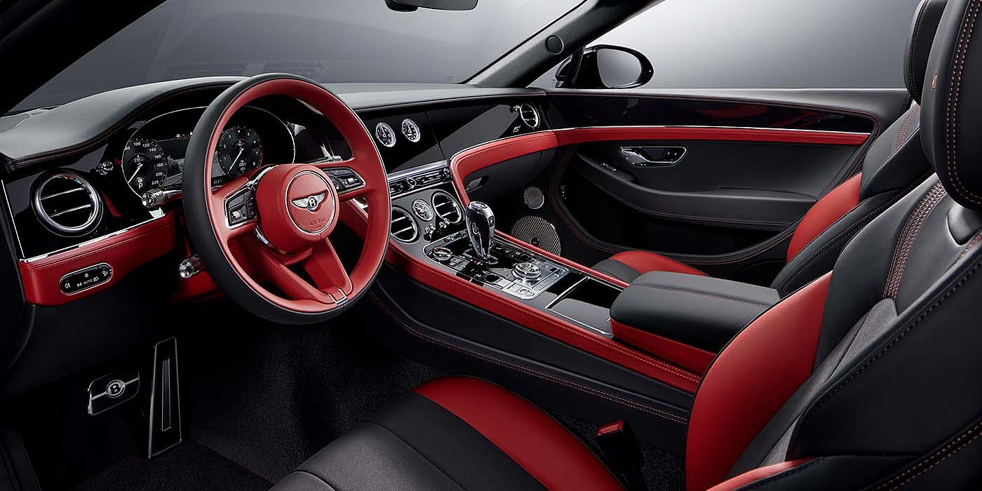 Bentley Hannover Bentley Continental GTC S convertible front interior in Beluga black and Hotspur red hide with high gloss carbon fibre veneer