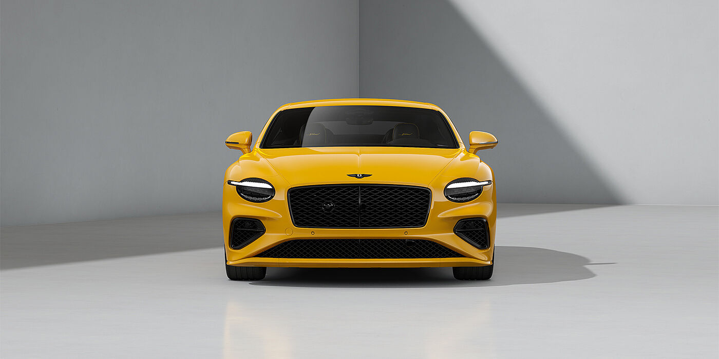 Bentley Hannover Bentley Continental GT Speed coupe in Monaco Yellow paint and 22" Ten spoke sport wheels - full front