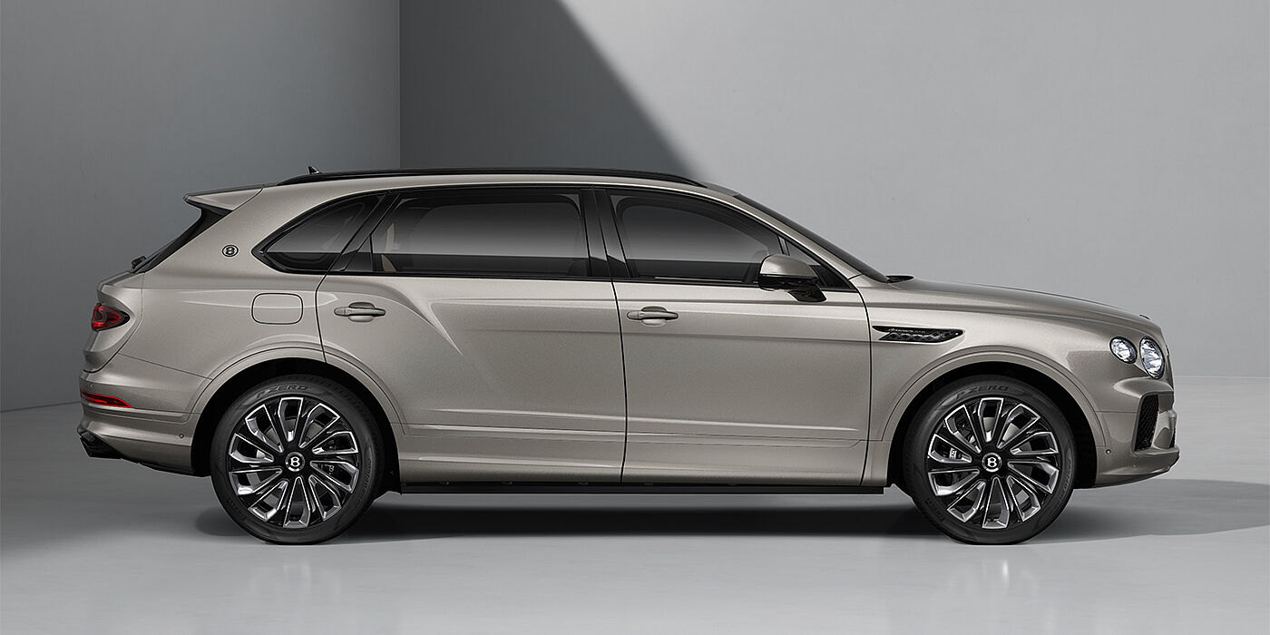 Bentley Hannover Bentayga EWB Artenara Edition SUV in Pale Brodgar paint with 22" Mulliner Gloss black wheel profile