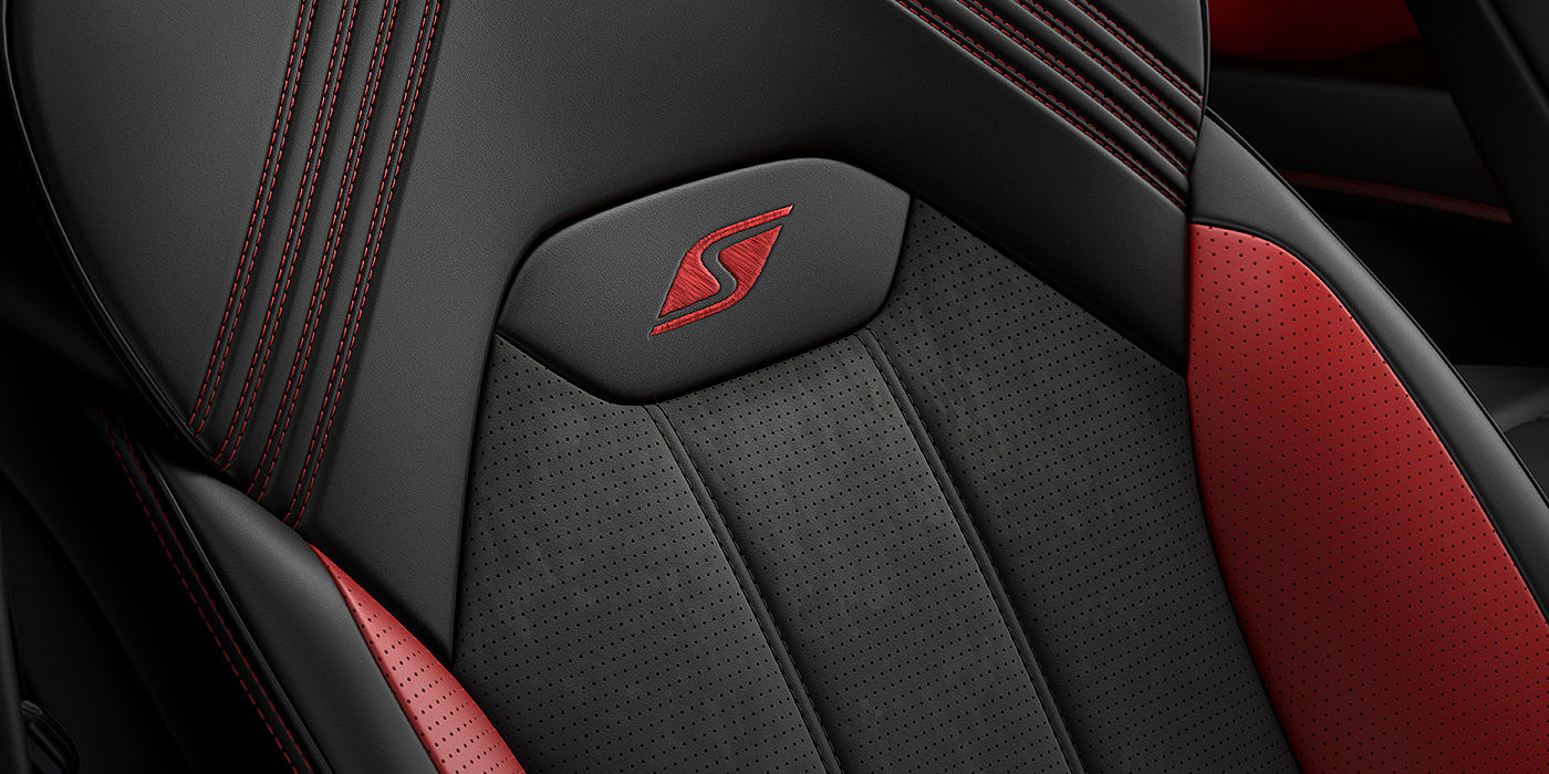 Bentley Hannover Bentley Bentayga S seat with detailed red Hotspur stitching and black Beluga coloured hide. 