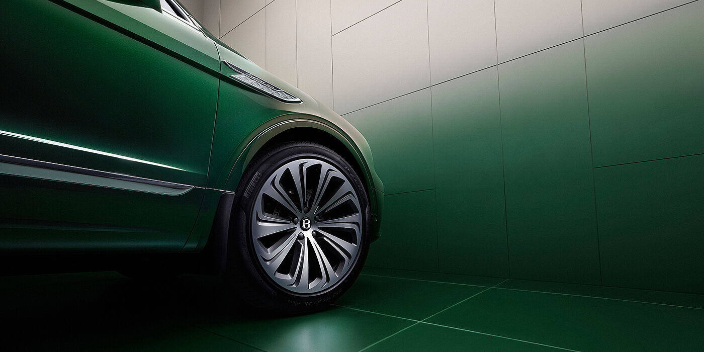 Bentley Hannover Bentley Bentayga Atelier Edition SUV in Light Emerald green paint front side detail with 22 inch 10 spoke wheel