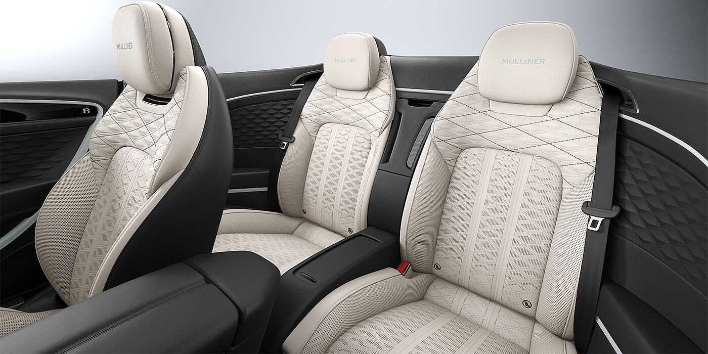 Bentley Hannover Bentley Continental GTC Mulliner convertible rear interior in Linen and Beluga black hides with Breeze accent hide