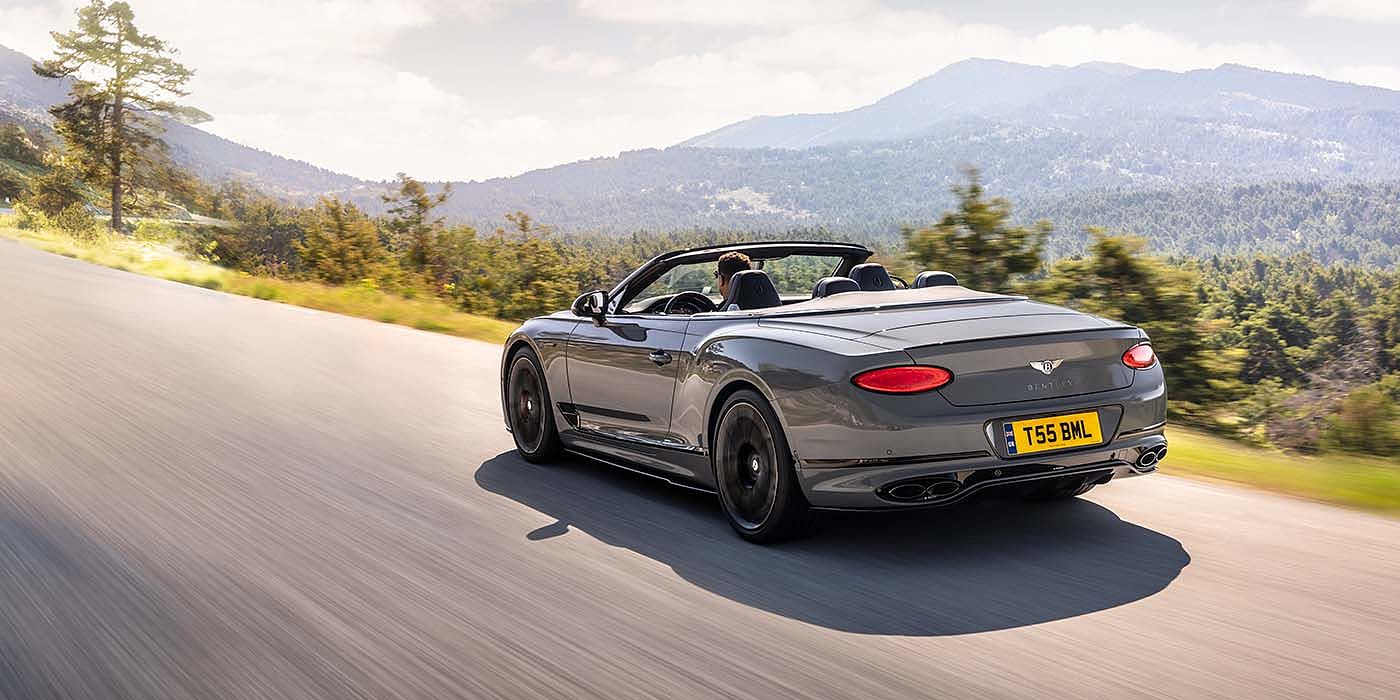 Bentley Hannover Bentley Continental GTC S convertible in Cambrian Grey paint rear 34 dynamic driving