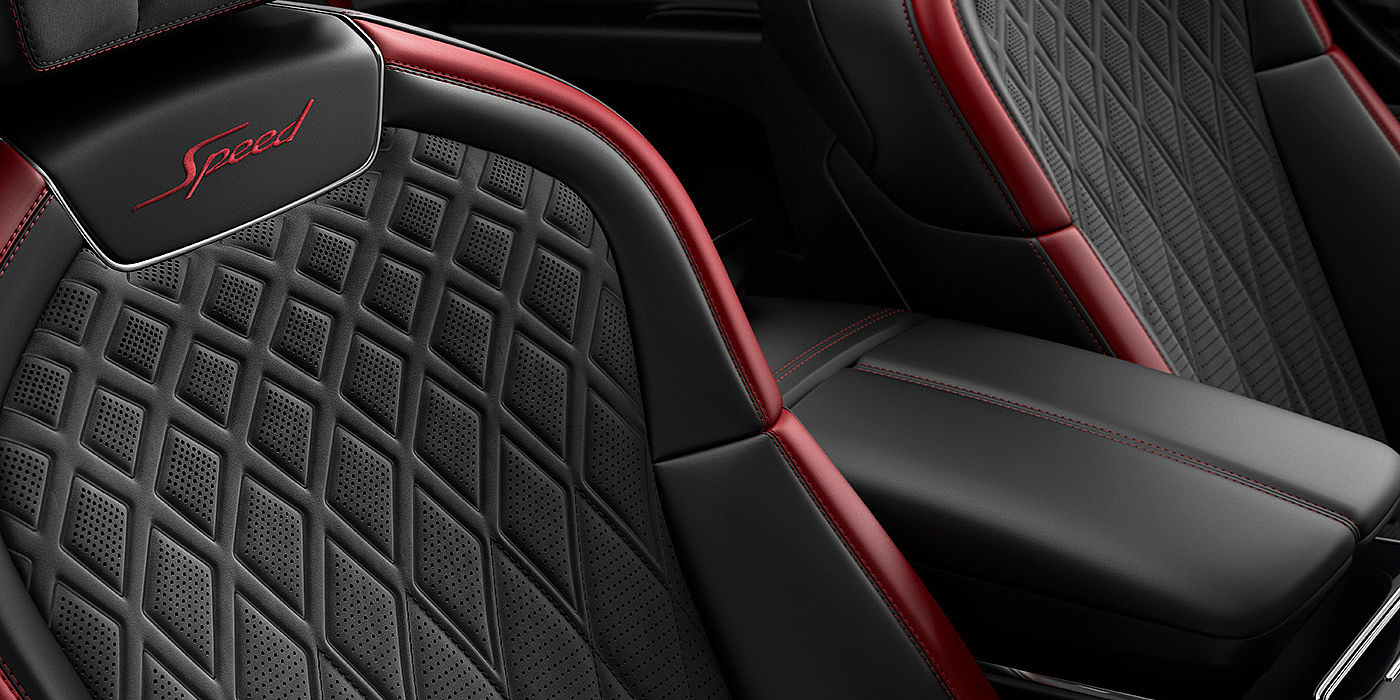 Bentley Hannover Bentley Flying Spur Speed sedan seat stitching detail in Beluga black and Cricket Ball red hide