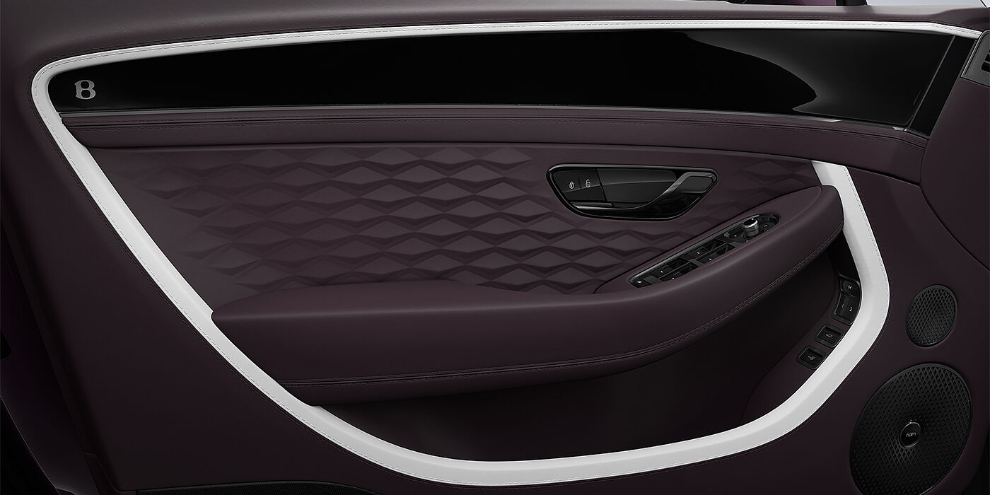 Bentley Hannover Bentley Continental GT Mulliner coupe door detail in Beluga black and Damson hides with white accent hide