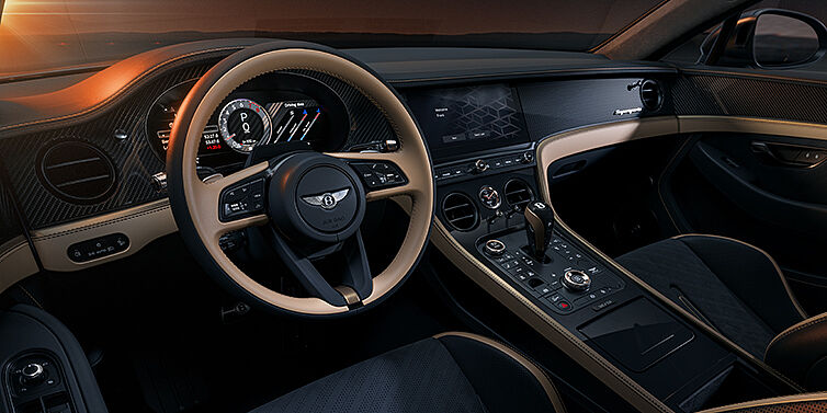 Bentley Hannover Bentley Supersports front interior in Beluga and Camel hides with Bronze accents and high gloss black carbon fibre veneer.