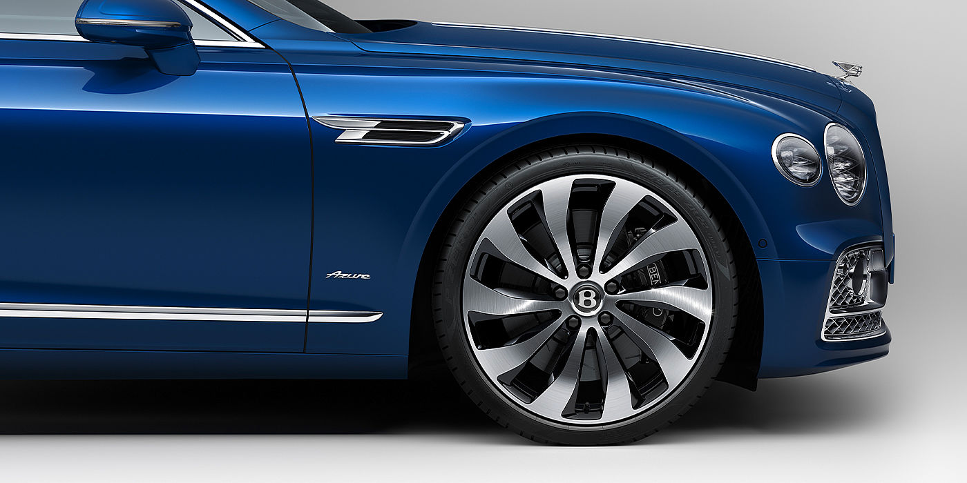 Bentley Hannover Bentley Flying Spur Azure sedan side close up in Sequin Blue paint with Azure badge