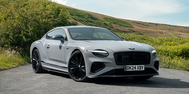 Bentley Hannover Bentley Continental GT front three quarter with Carbon Fibre Specification parked on road.