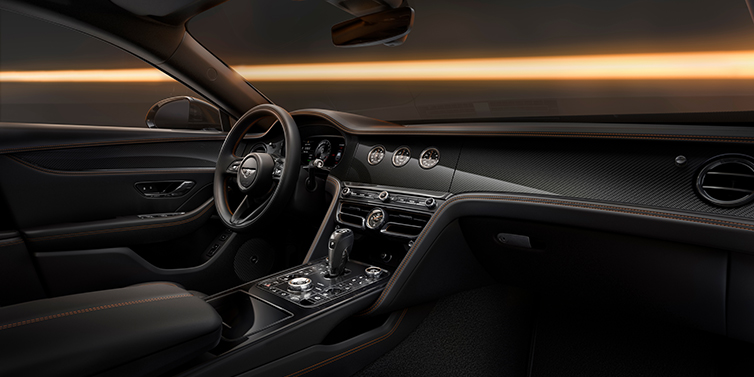 Bentley Hannover Bentley Flying Spur Black Edition sedan front interior in Beluga black hide with High Gloss Carbon Fibre veneer