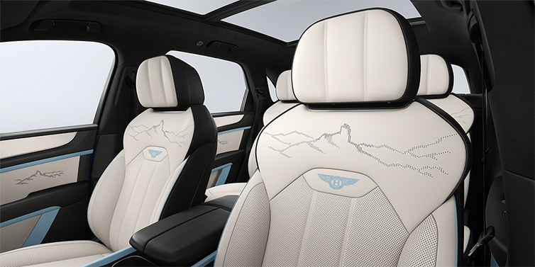 Bentley Hannover Bentley Bentayga Artenara Edition SUV front seats in Linen and Beluga Black hides with Light Blue accents and Artenara stitch detail
