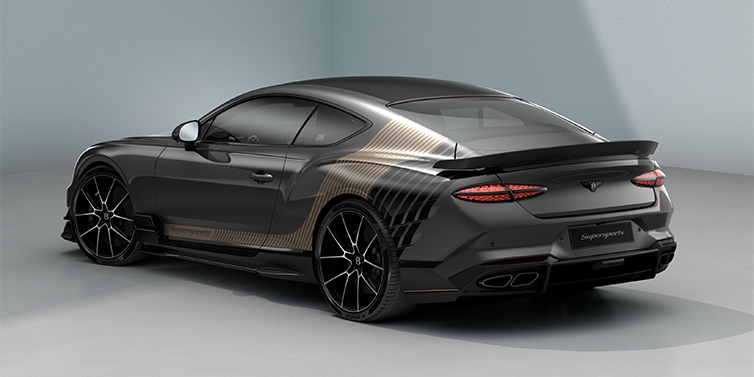 Bentley Hannover Bentley Supersports rear three quarter in "Nightfall Design theme with Anthracite paint and Beluga black and Camel brown paint stripes across the rear haunch.
