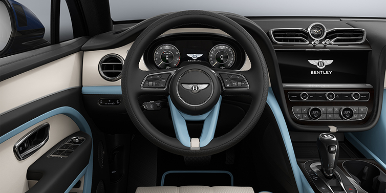 Bentley Hannover Bentley Bentayga Artenara Edition SUV steering wheel view in Linen and Beluga Black hides with Light Blue accents and Piano Linen veneer